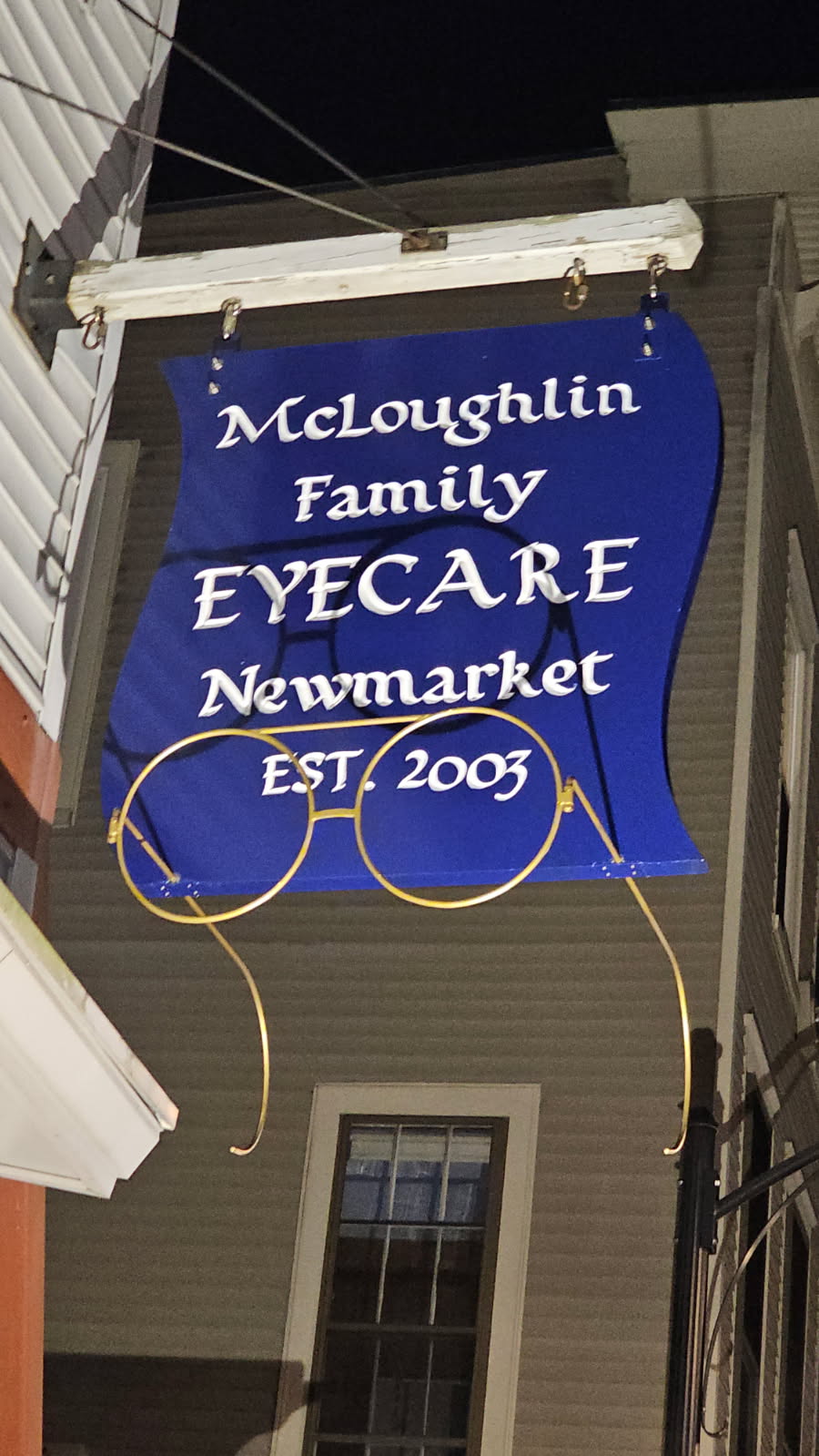 Sign installation on a building